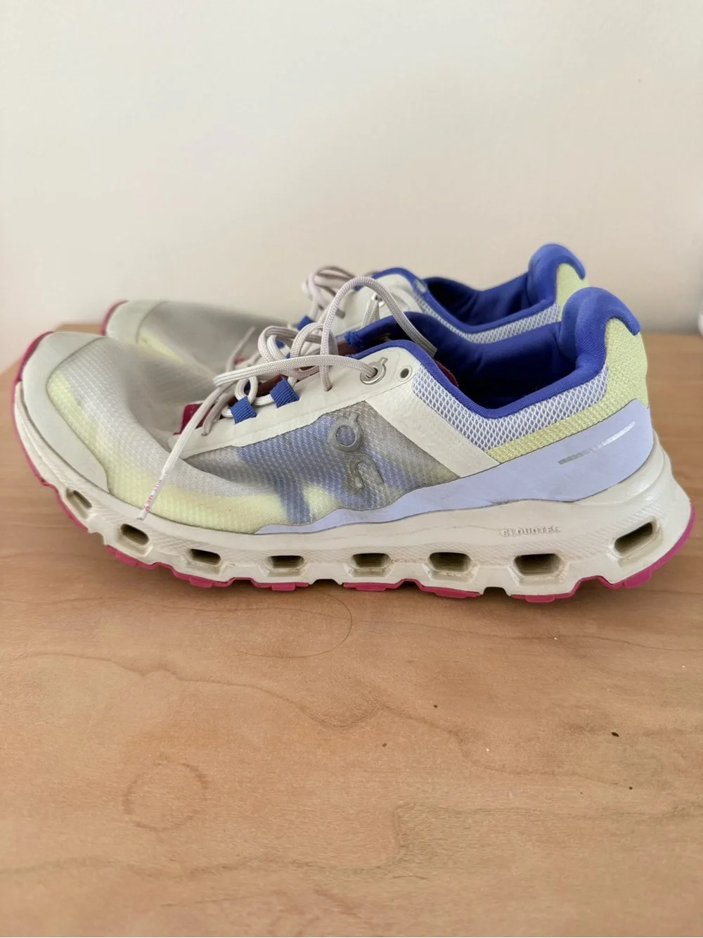 On Running Women's Lightweight Trainers in White, Yellow & Purple Accents